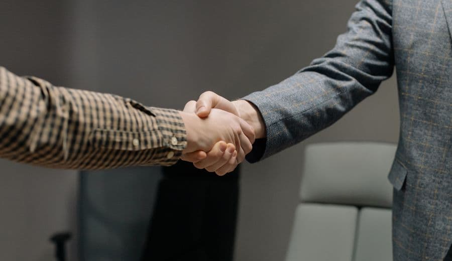 Two people shaking hands